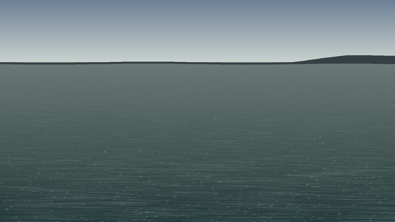 Murky, grey-green water under a dull sky, the surface flat and uninviting.